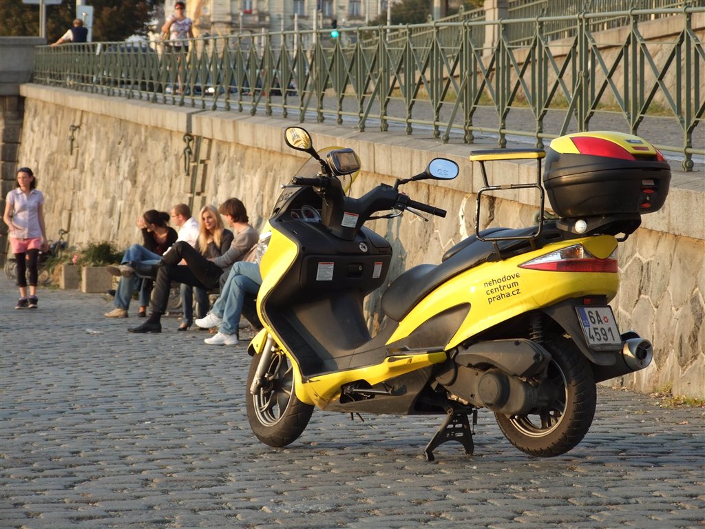 Na den mototaxikářem